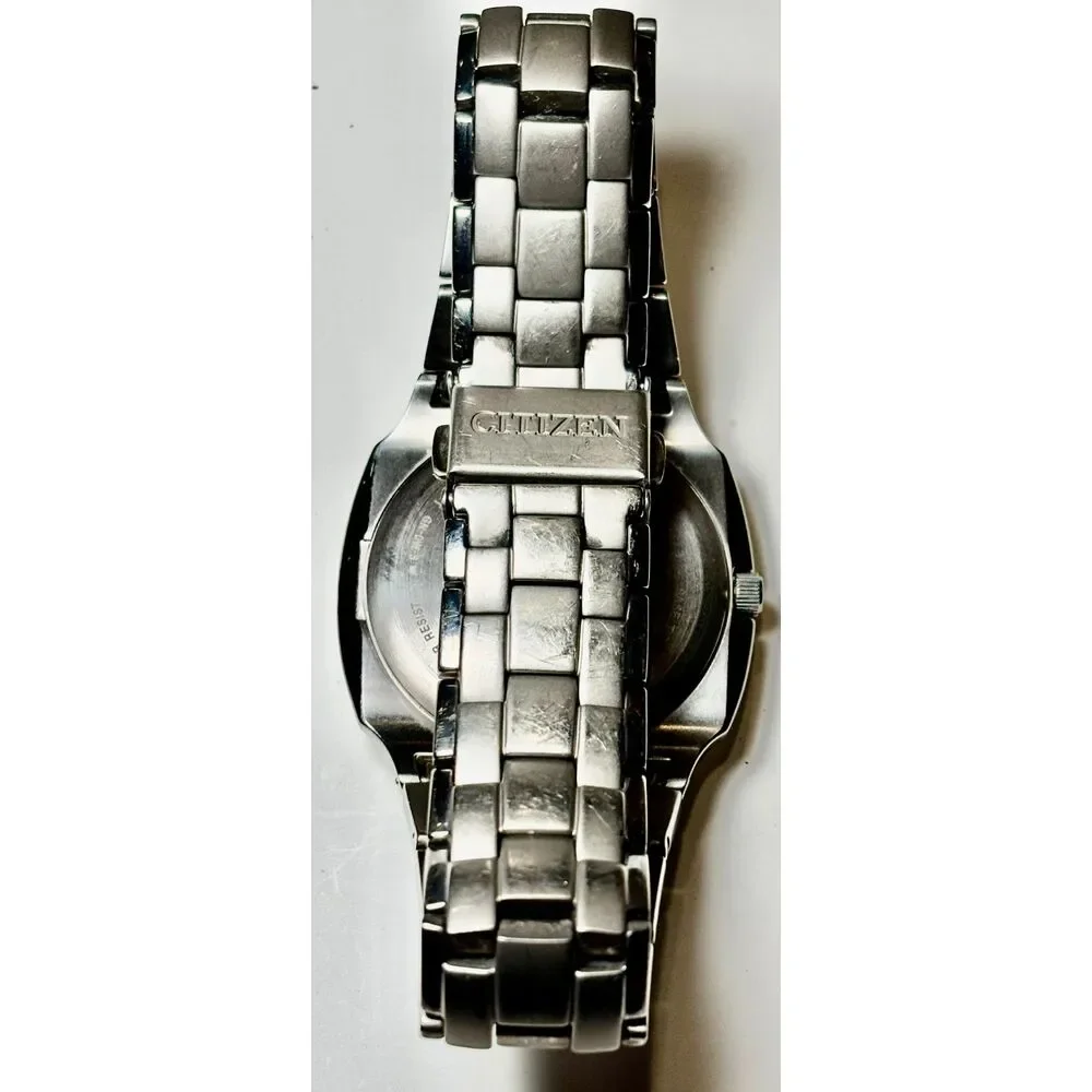 Citizen Eco-Drive Titanium Men's Watch – Black Sunburst Dial (Ref. E111-S049610)